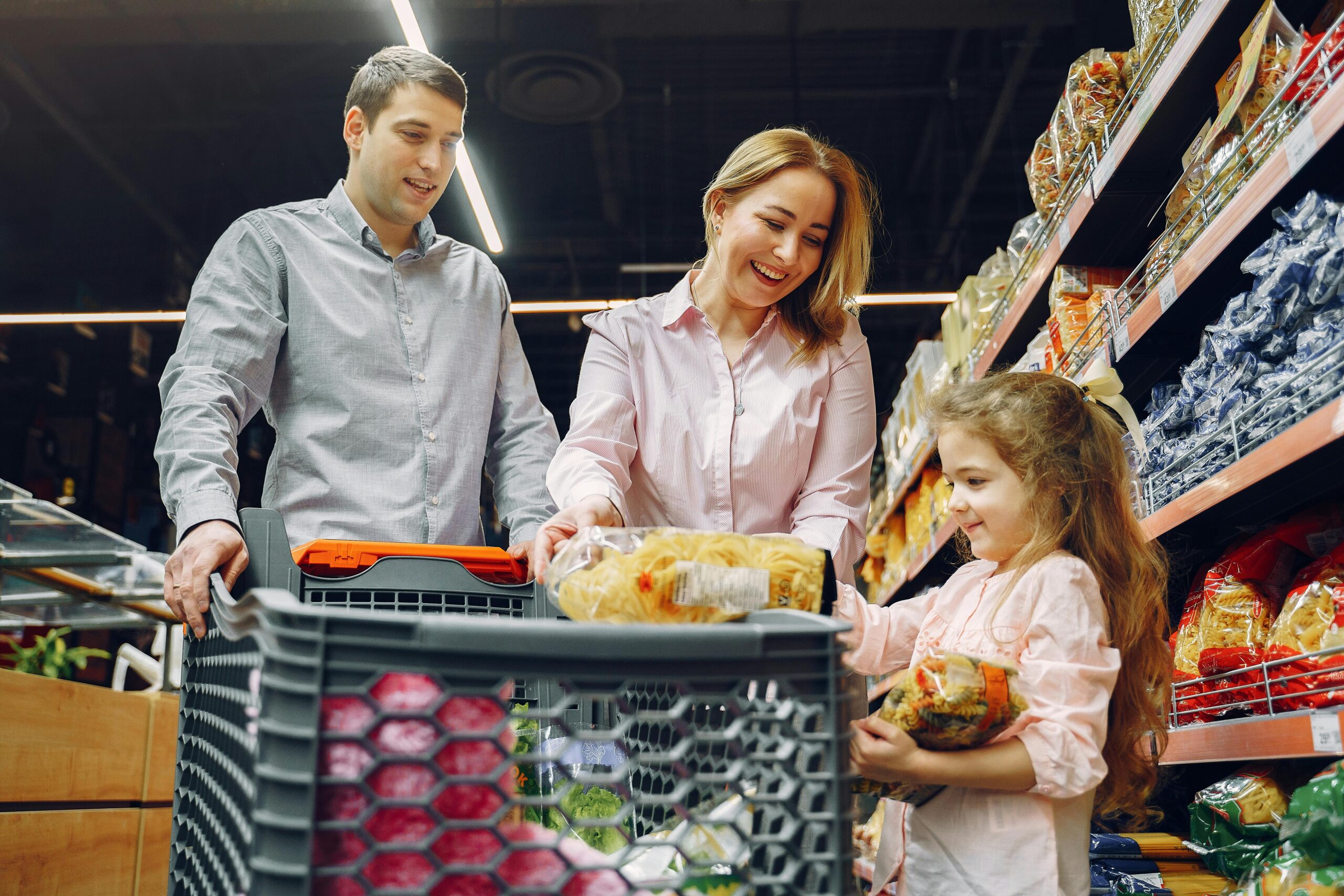a family of three grocery shopping