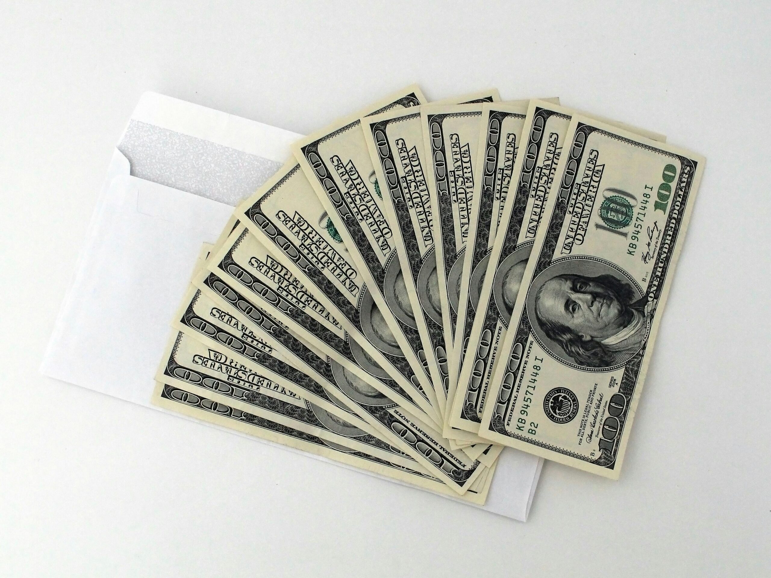 pexels-pixabay-534229 (31) cash fanned out over a white envelope